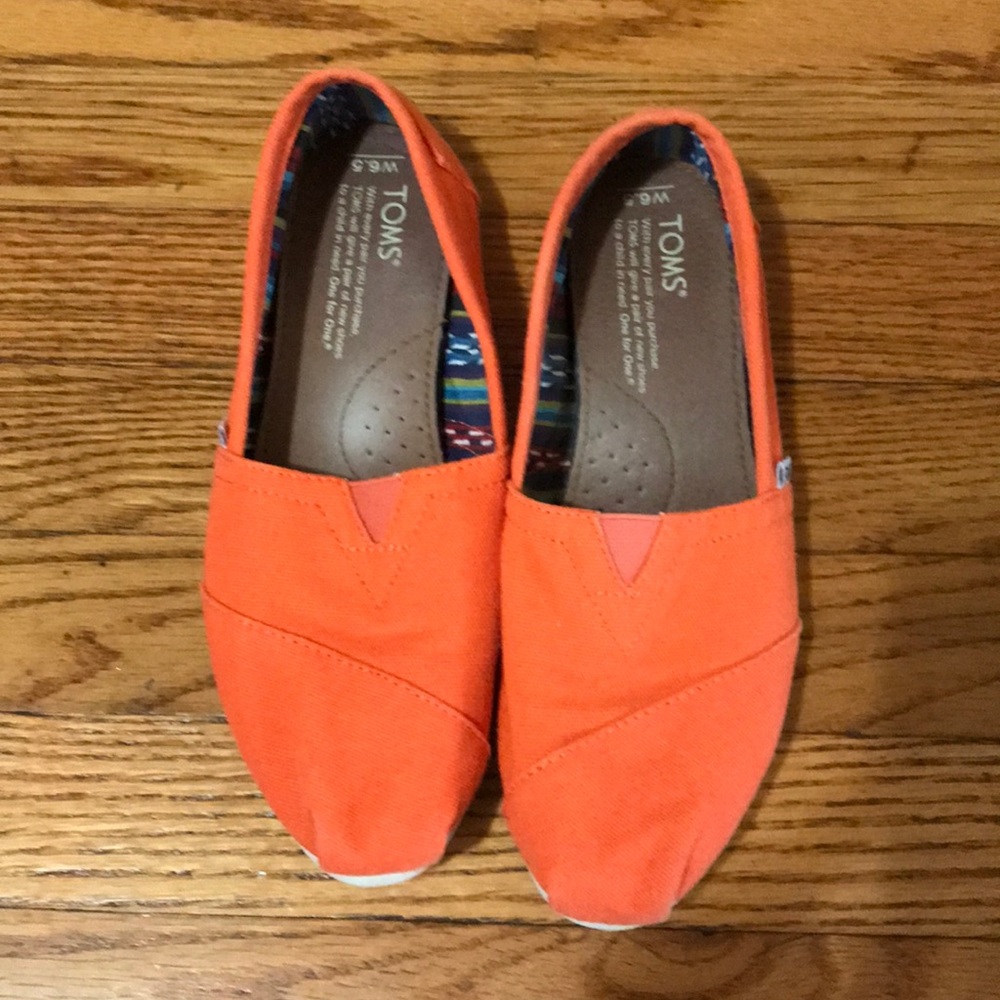 Toms orange shoes